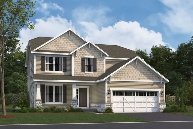 a view of a white house with large windows and a yard