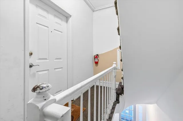 a view of a hallway with elevator