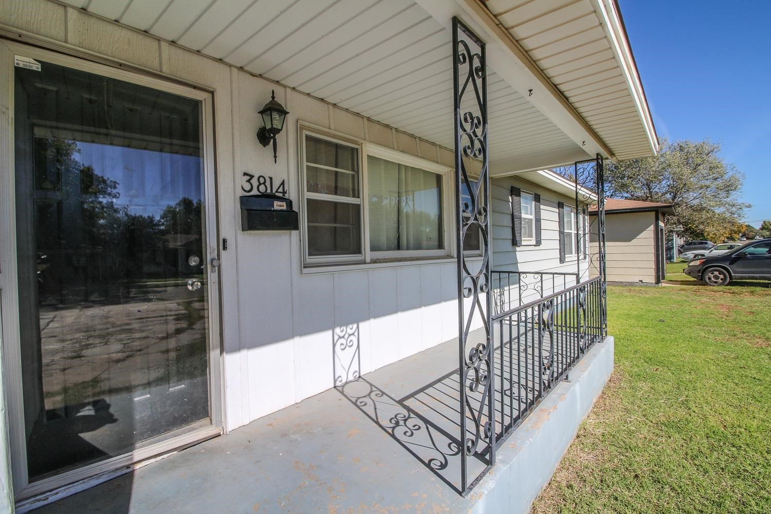 3814 32nd Street Lubbock, TX 79410 - Photo 3 of 10 a view of a balcony with a potted plants