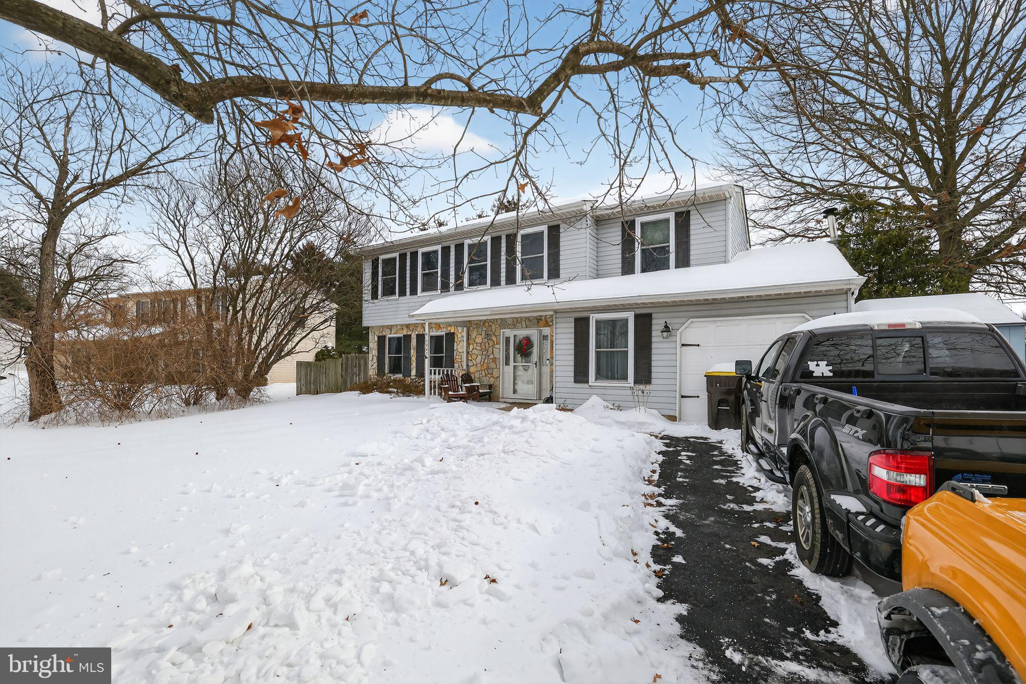 1997 Sunrise Way Jamison, PA 18929 - Photo 32 of 38 a view of a house with a yard covered with snow in the backyard