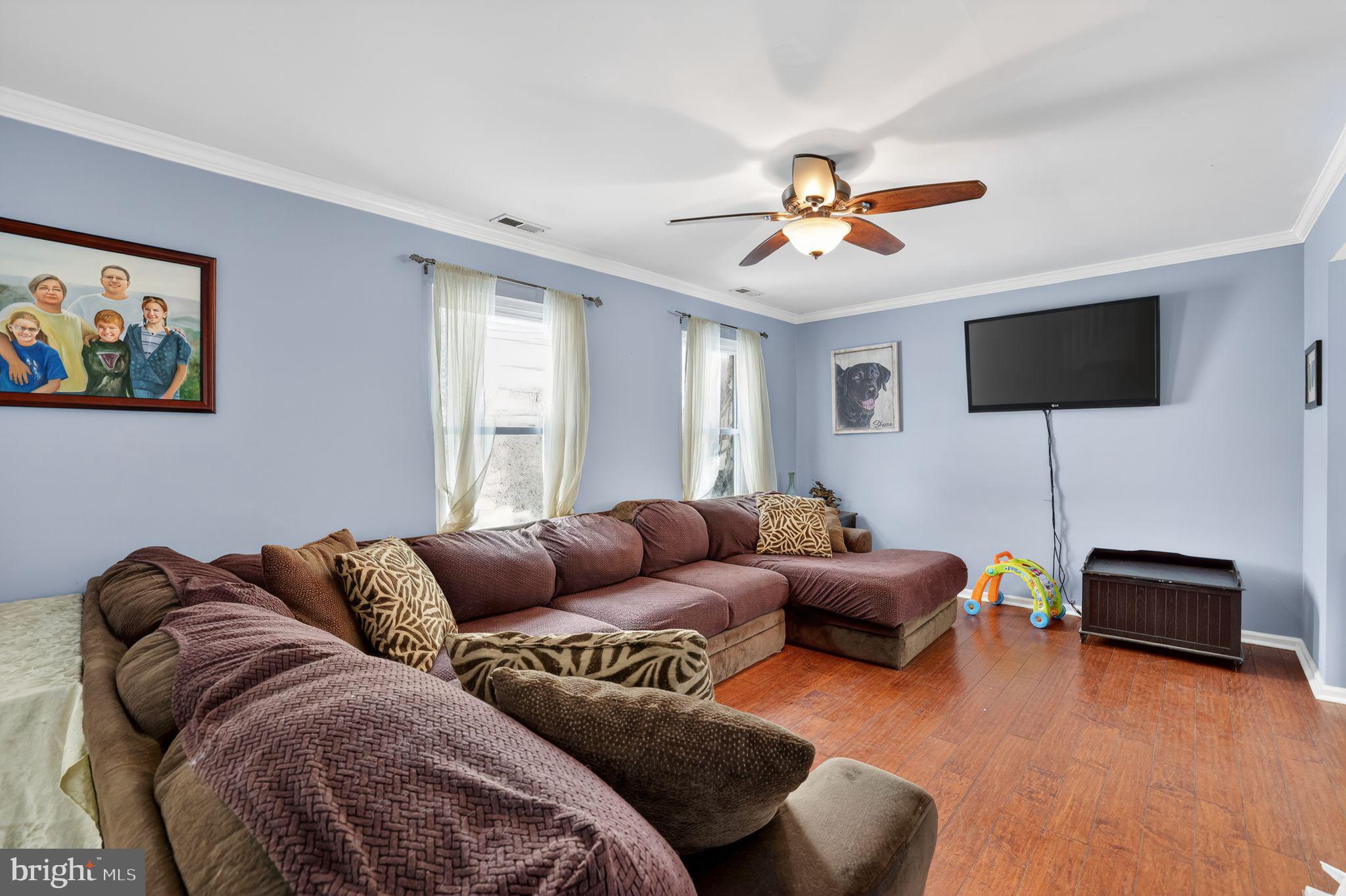 1997 Sunrise Way Jamison, PA 18929 - Photo 4 of 38 a living room with furniture a ceiling fan and a window