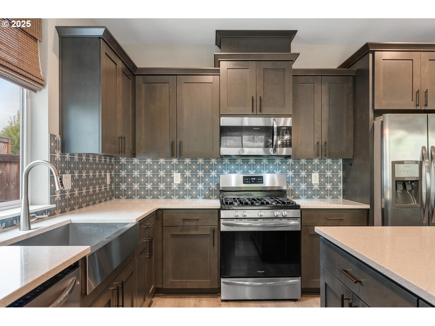 1809 Northeast 169th Street Ridgefield, WA 98642 - Photo 17 of 47 a kitchen with a sink appliances and cabinets