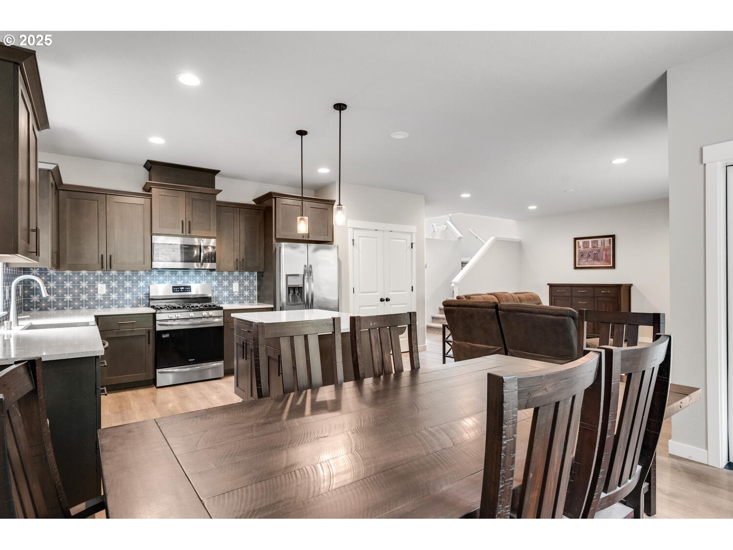 1809 Northeast 169th Street Ridgefield, WA 98642 - Photo 20 of 47 a large kitchen with a table and chairs