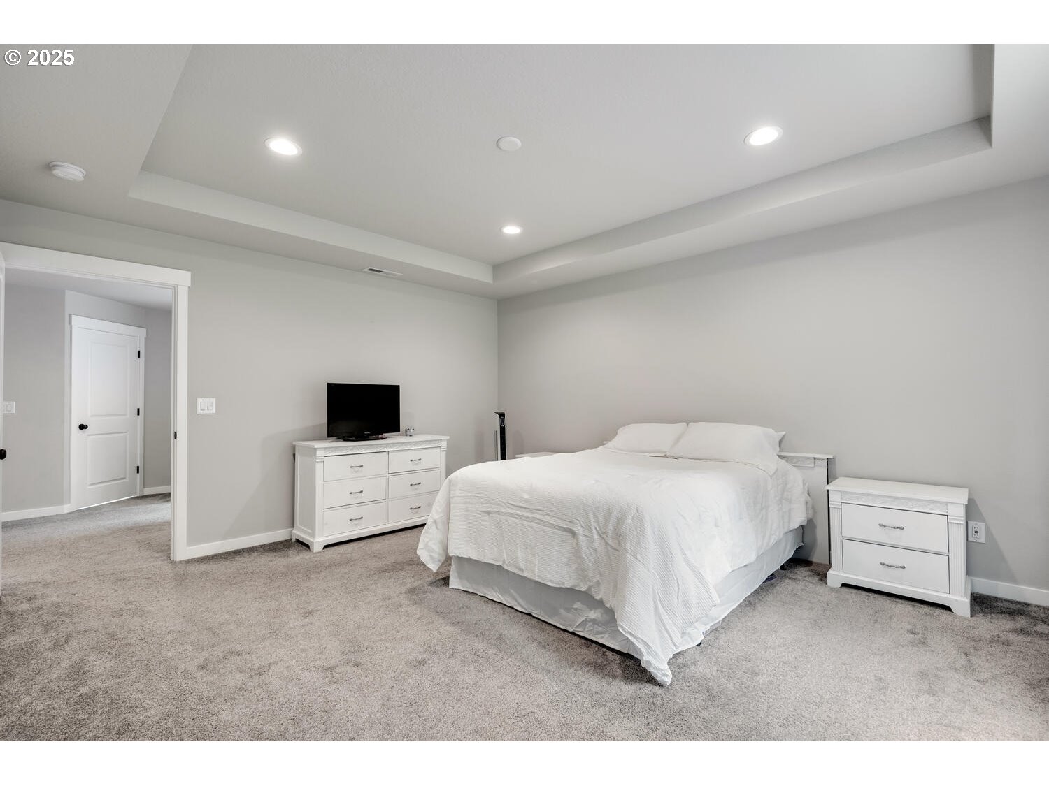 1809 Northeast 169th Street Ridgefield, WA 98642 - Photo 29 of 47 a bed room with a bed and a television