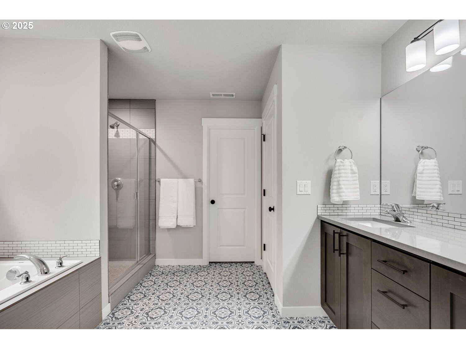 1809 Northeast 169th Street Ridgefield, WA 98642 - Photo 30 of 47 a bathroom with a sink and a mirror