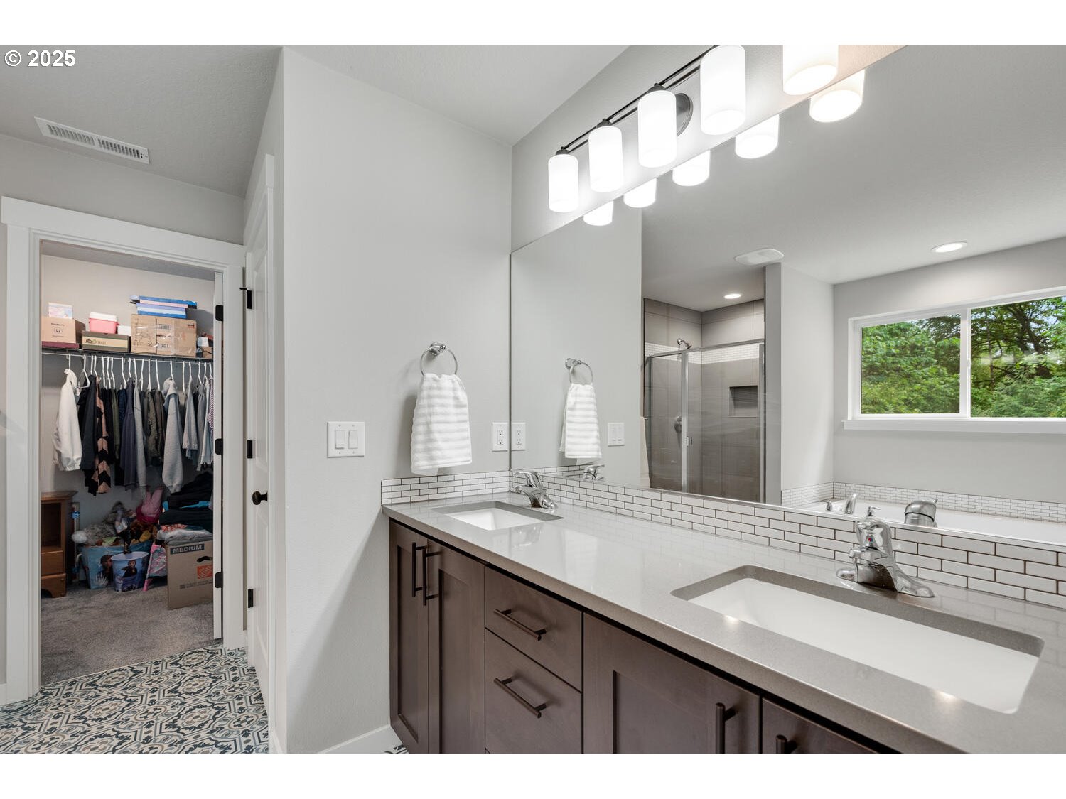 1809 Northeast 169th Street Ridgefield, WA 98642 - Photo 34 of 47 a bathroom with a sink a vanity and a mirror