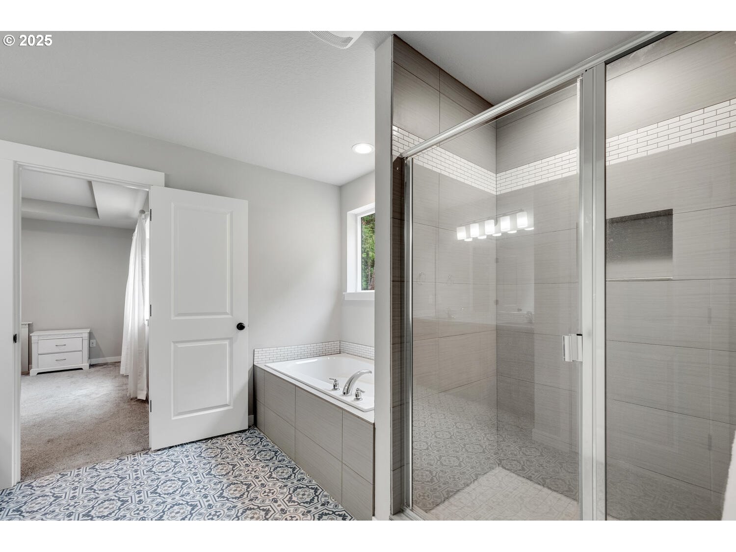 1809 Northeast 169th Street Ridgefield, WA 98642 - Photo 35 of 47 a bathroom with a bathtub and a shower