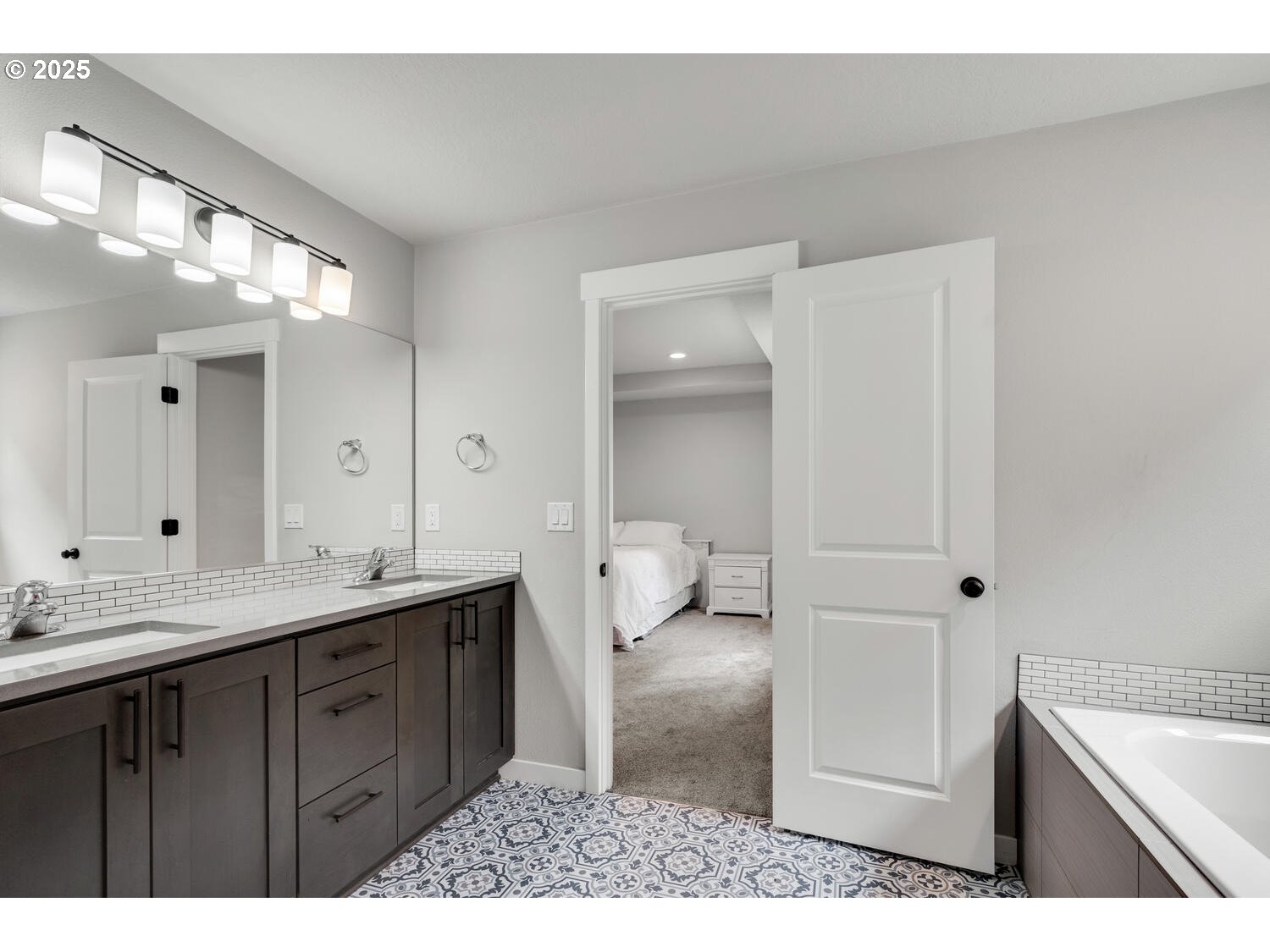 1809 Northeast 169th Street Ridgefield, WA 98642 - Photo 36 of 47 a bathroom with a sink a toilet and a mirror