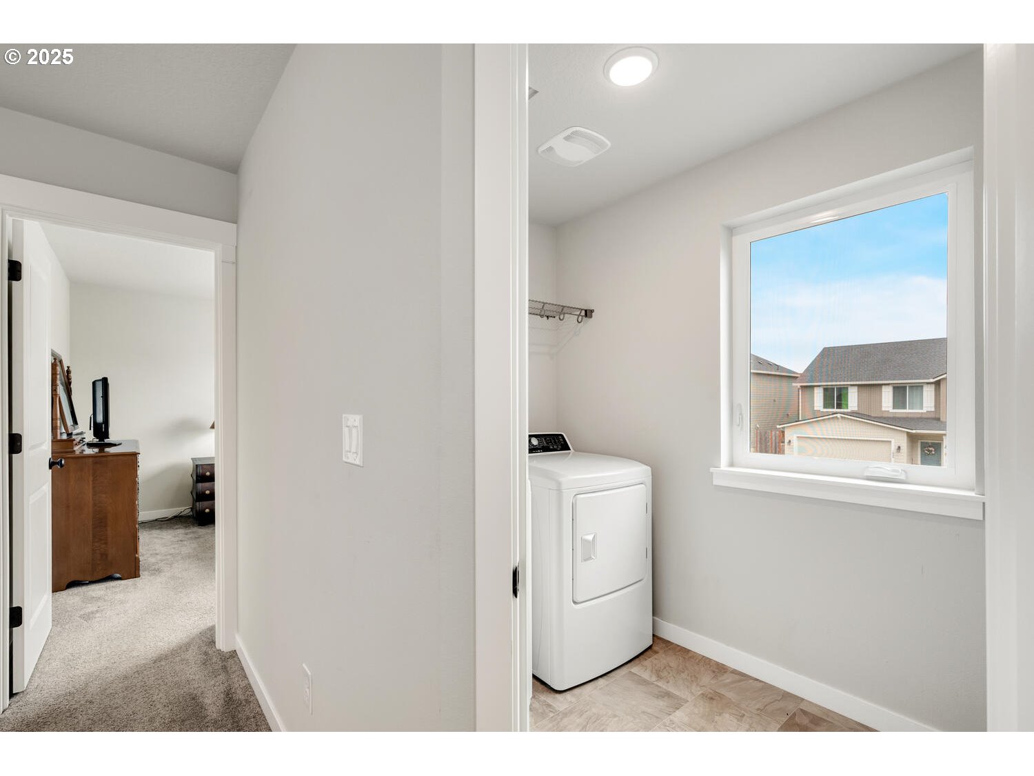 1809 Northeast 169th Street Ridgefield, WA 98642 - Photo 42 of 47 a view of a hallway and a livingroom with furniture