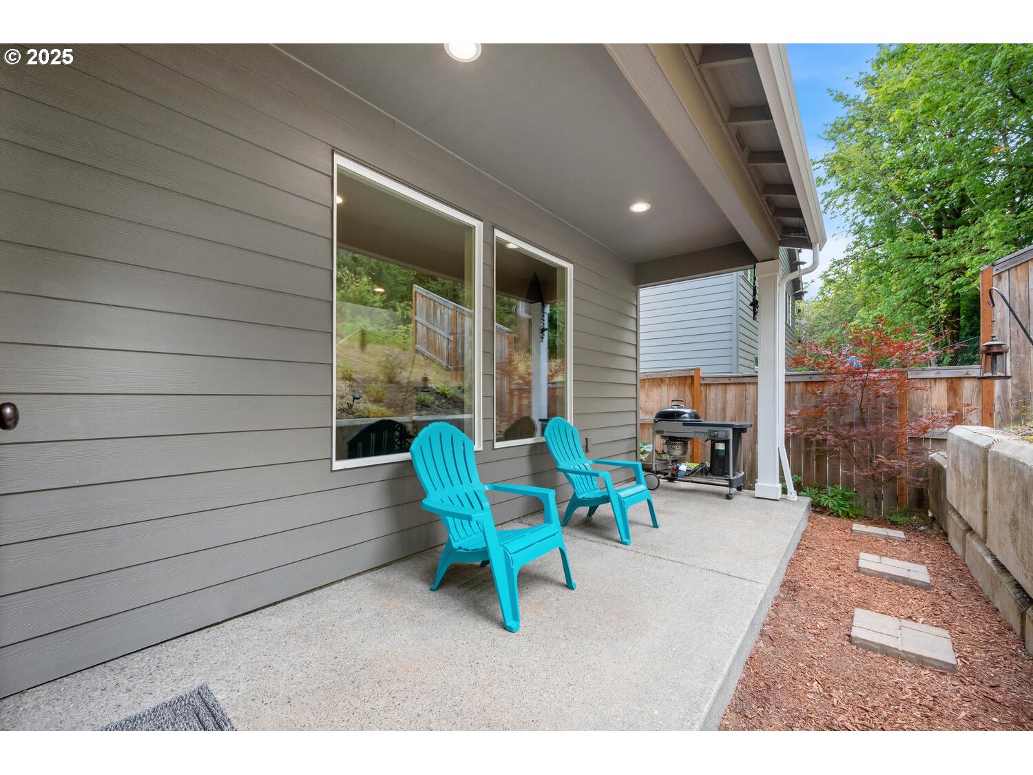 1809 Northeast 169th Street Ridgefield, WA 98642 - Photo 44 of 47 a backyard of a house with outdoor seating