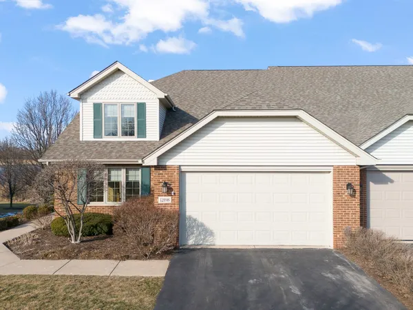 a view of a house with a garage