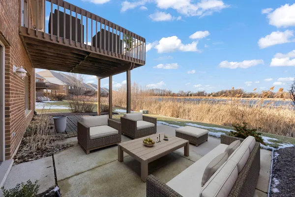 a balcony with furniture and city view