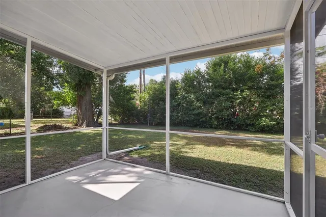 a view of a room and window