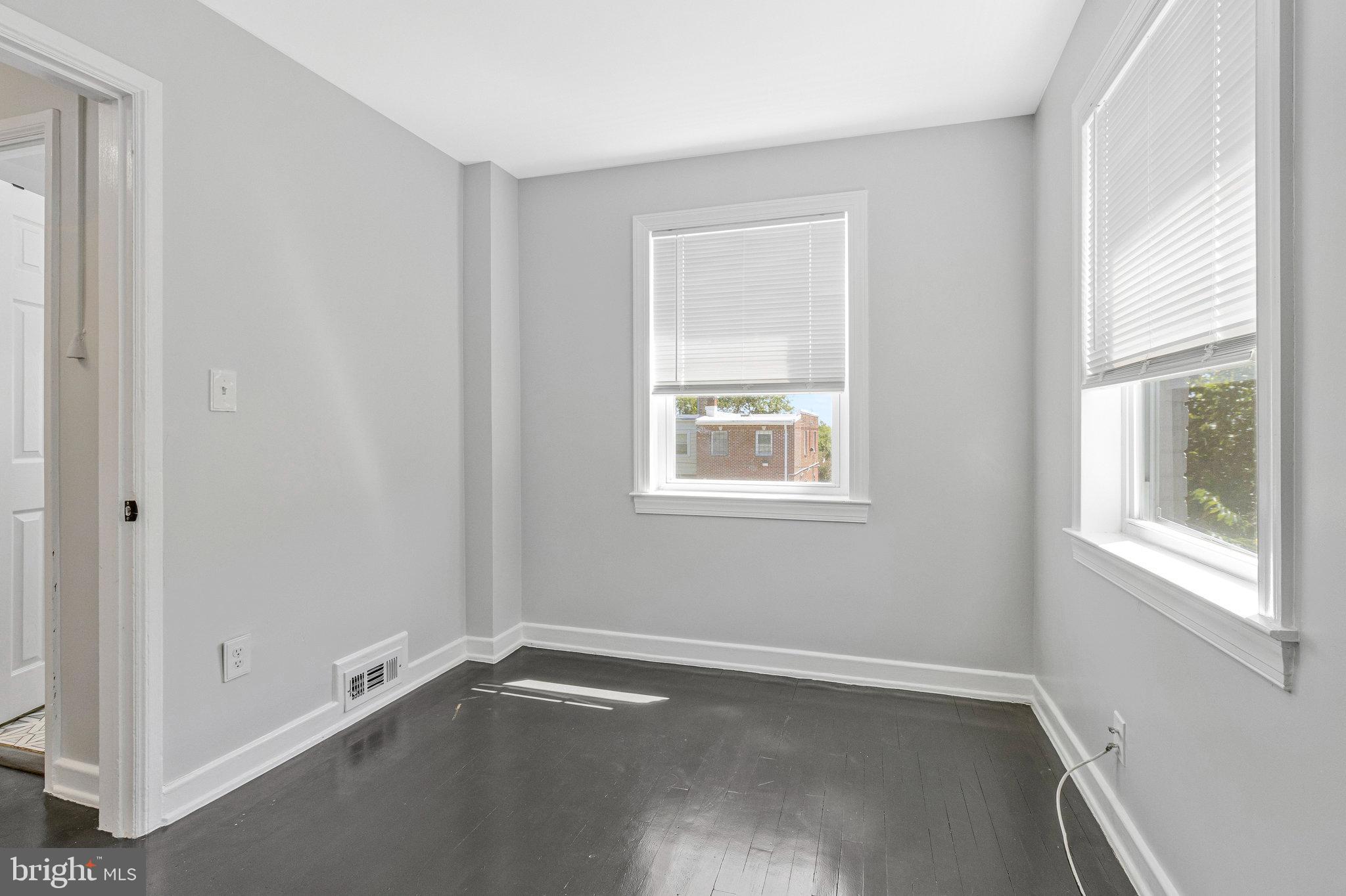 1925 Alabama Avenue Southeast Washington, DC 20020 - Photo 11 of 14 an empty room with windows