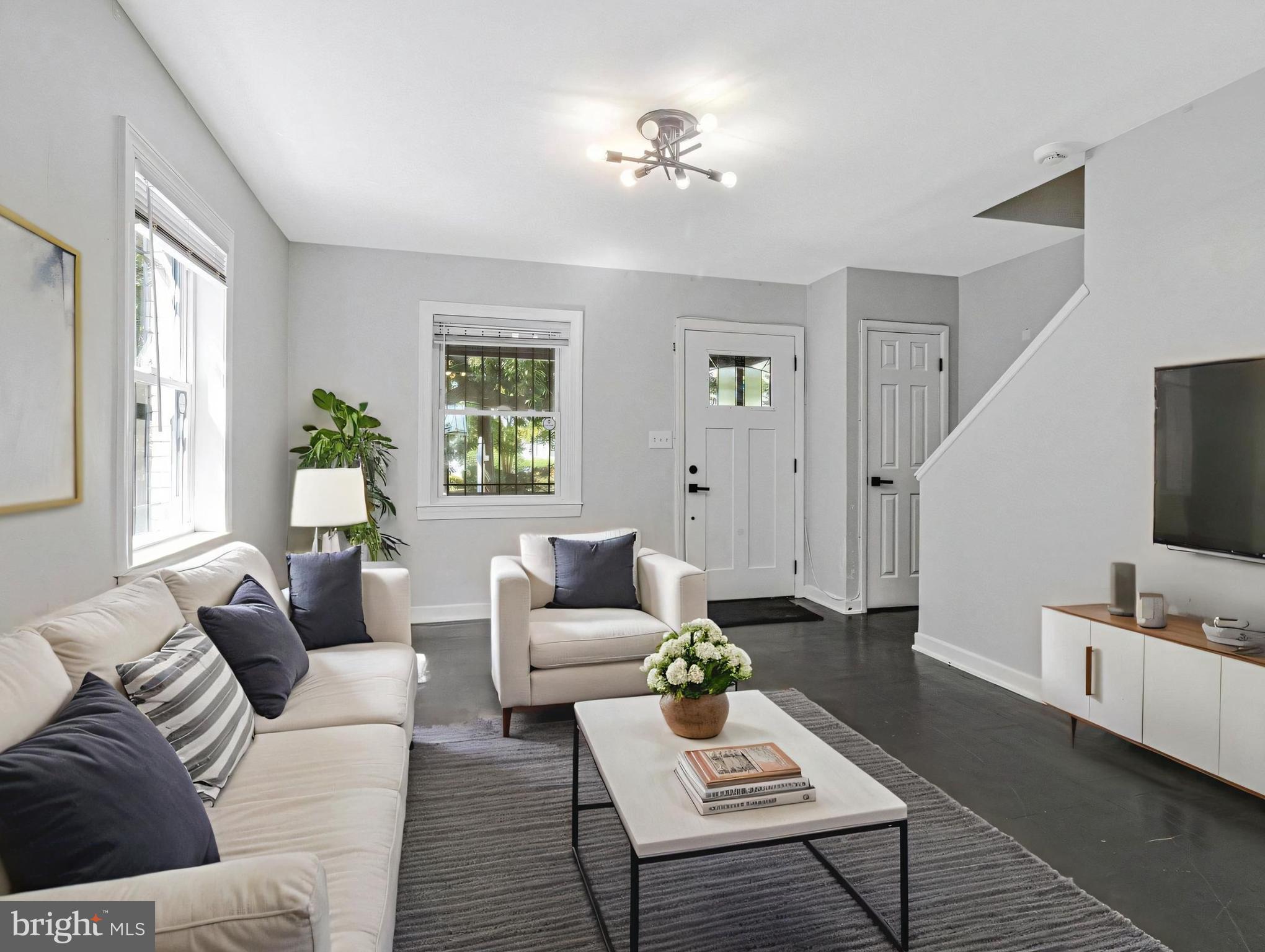 1925 Alabama Avenue Southeast Washington, DC 20020 - Photo 4 of 14 a living room with furniture and wooden floor