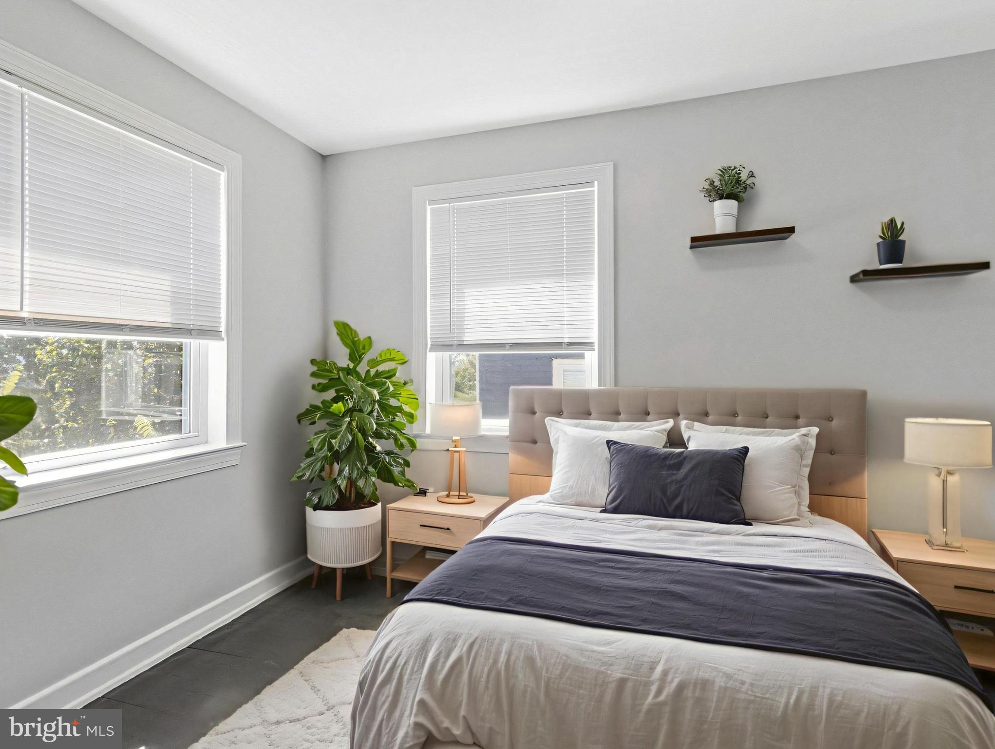 1925 Alabama Avenue Southeast Washington, DC 20020 - Photo 9 of 14 a bedroom with a bed and window