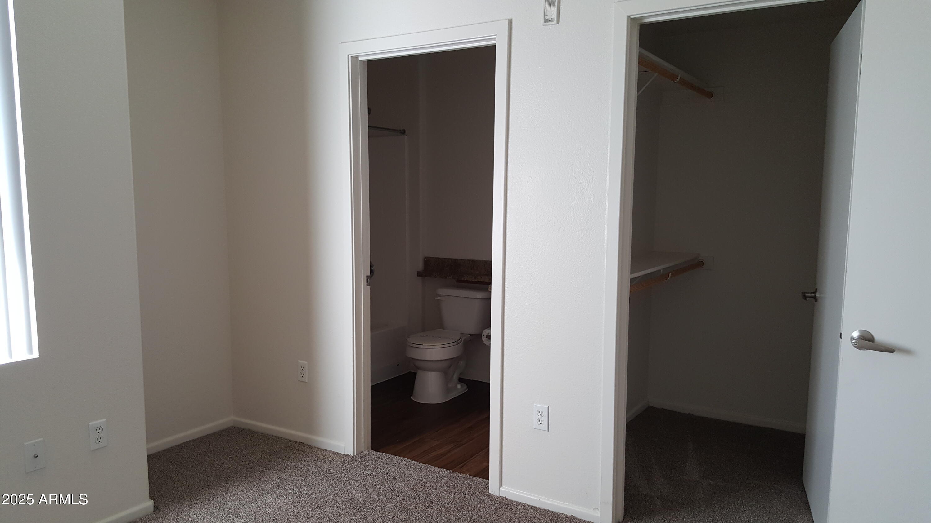 110 West Bell Road, Unit 2 Phoenix, AZ 85023 - Photo 6 of 18 Master Closet and Bath