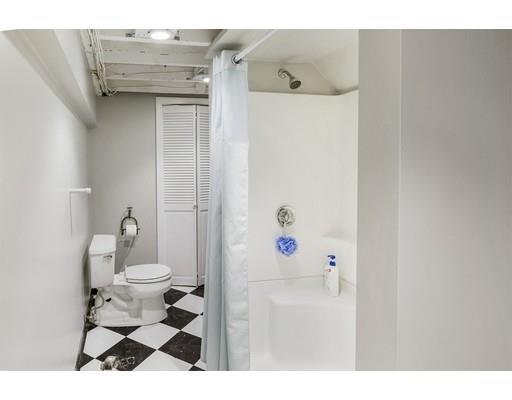 22 Berkeley Street Somerville, MA 02143 - Photo 19 of 28 a bathroom with a sink toilet and shower