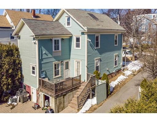 22 Berkeley Street Somerville, MA 02143 - Photo 25 of 28 a aerial view of a house with a yard