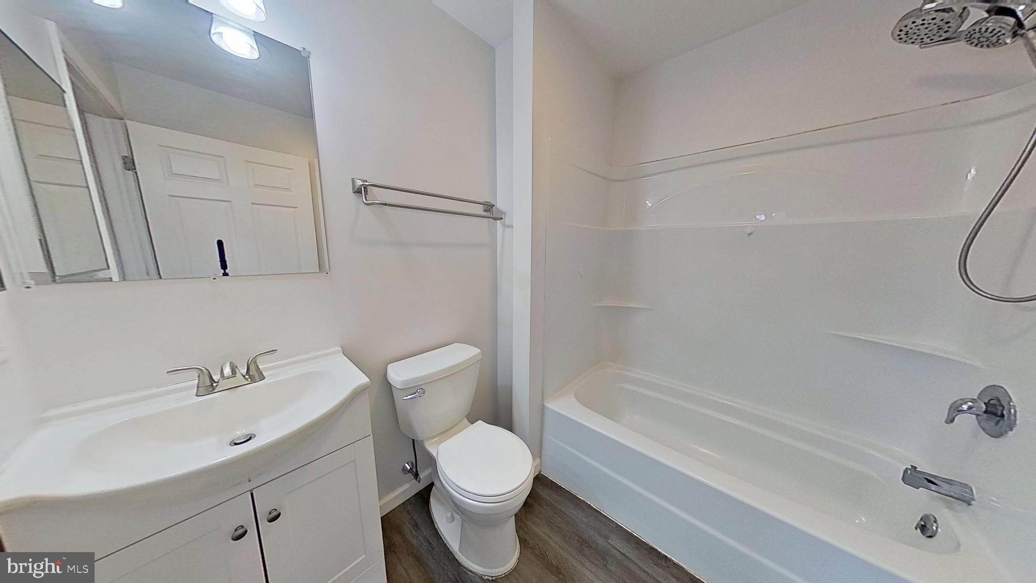 1821 Detters Mill Road Dover, PA 17315 - Photo 5 of 9 a bathroom with a bathtub shower sink vanity and toilet