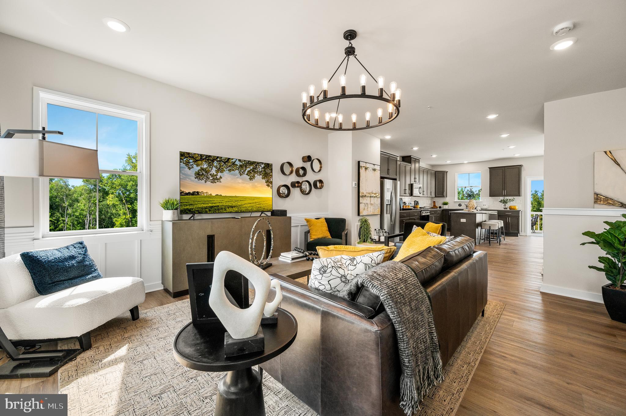 27 Atkins Drive Bridgeport, PA 19405 - Photo 15 of 35 a living room with furniture and a chandelier