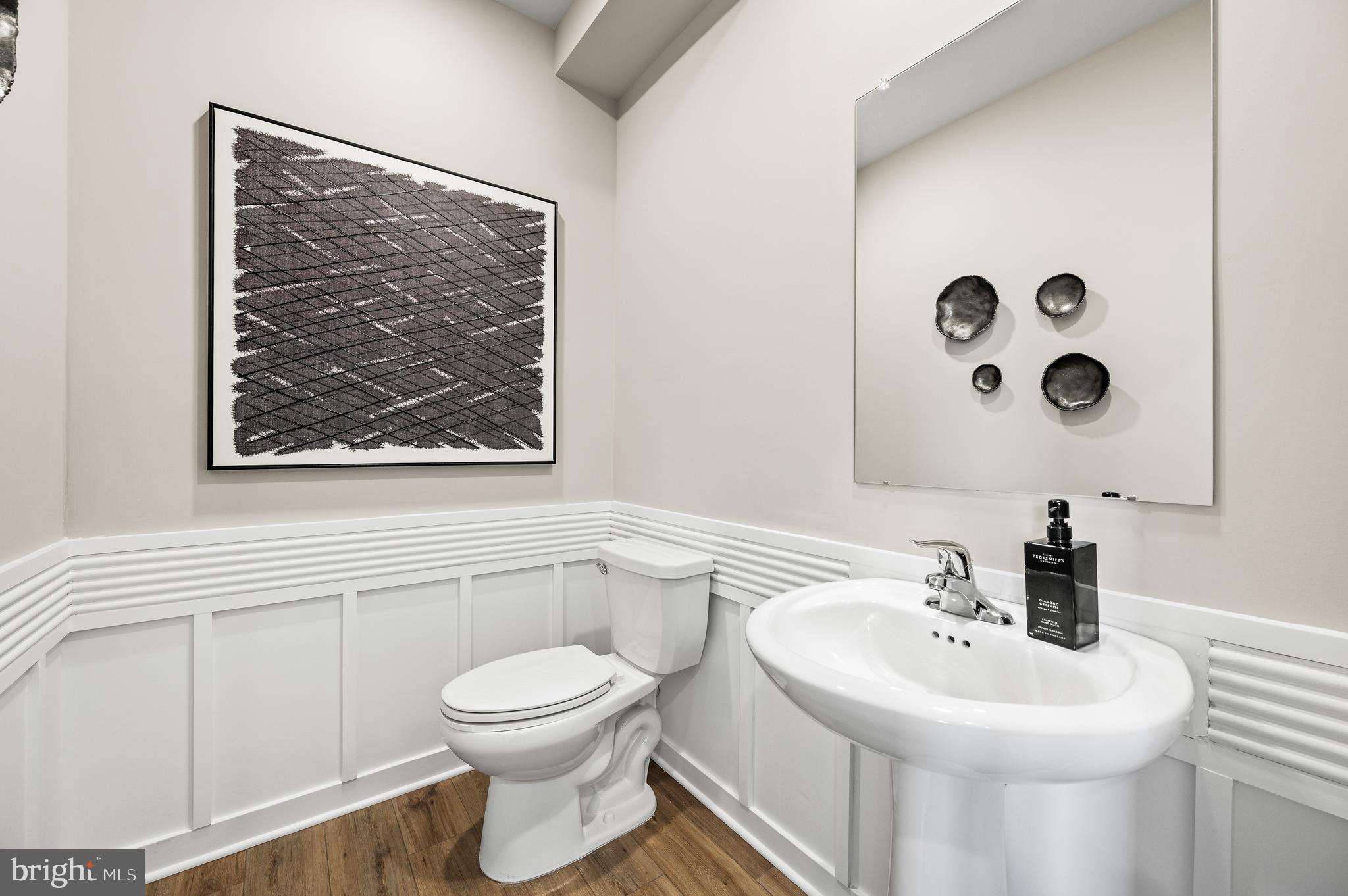 27 Atkins Drive Bridgeport, PA 19405 - Photo 5 of 35 a bathroom with a toilet sink and mirror