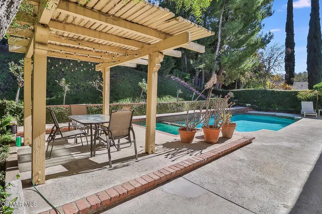 a view of a two chair in the patio