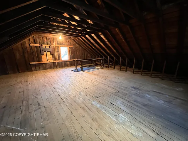 a view of a backyard of the house