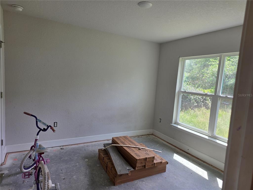 9 Cedar Run Ocala, FL 34472 - Photo 11 of 15 a room with gym equipment