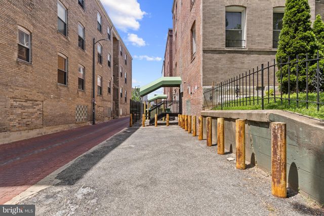 a view of a street with a building and a street view
