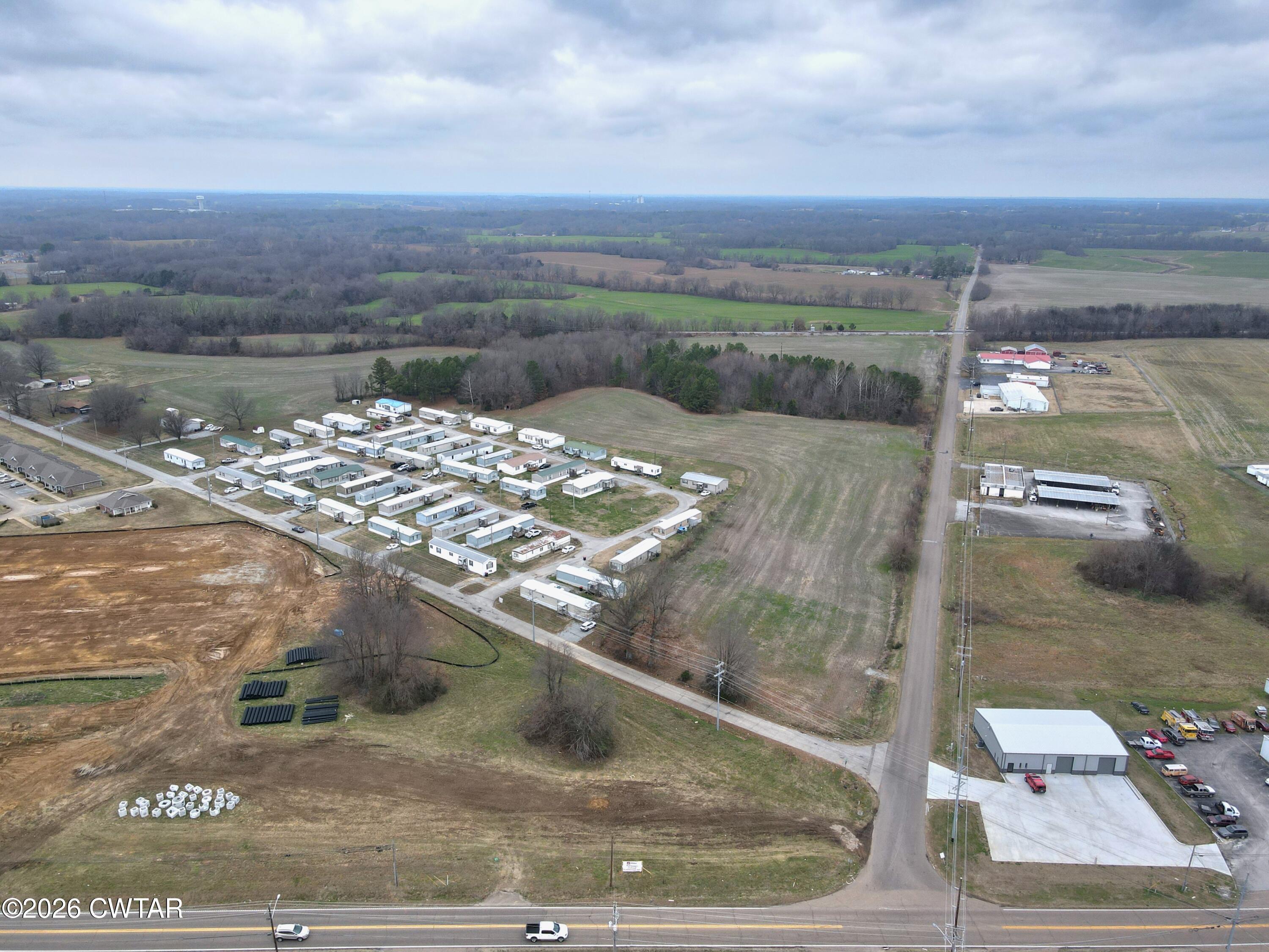 3101 Warren Road Humboldt, TN 38343 - Photo 7 of 13 a view of a lake from a balcony