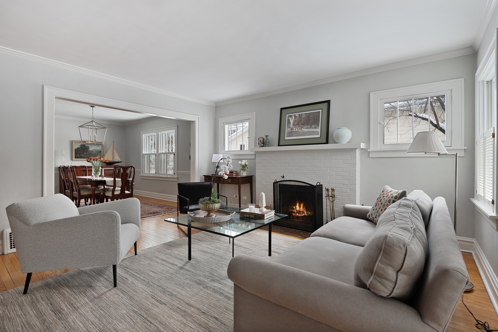 969 Willow Road Winnetka, IL 60093 - Photo 5 of 33 a living room with furniture and a fireplace