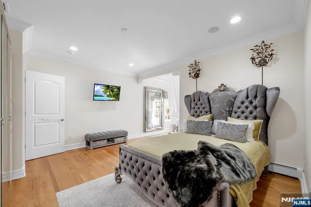 a bedroom with a bed and a view of bathroom