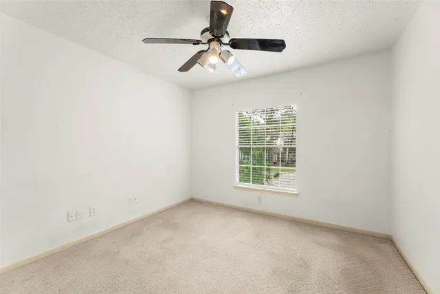 a bathroom with a tub and shower