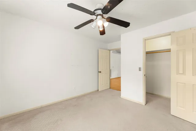 a bathroom with a sink a mirror and a shower