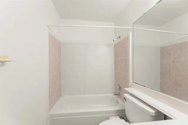 a view of a park with large trees