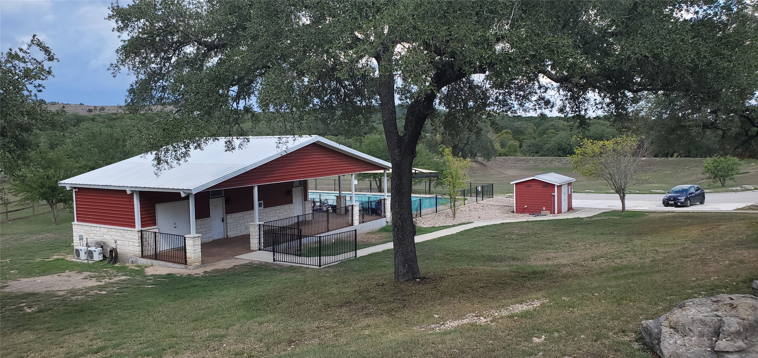 588 Balcones Ridge Way Bertram, TX 78605 - Photo 15 of 16 View of the Pool and Park areas
