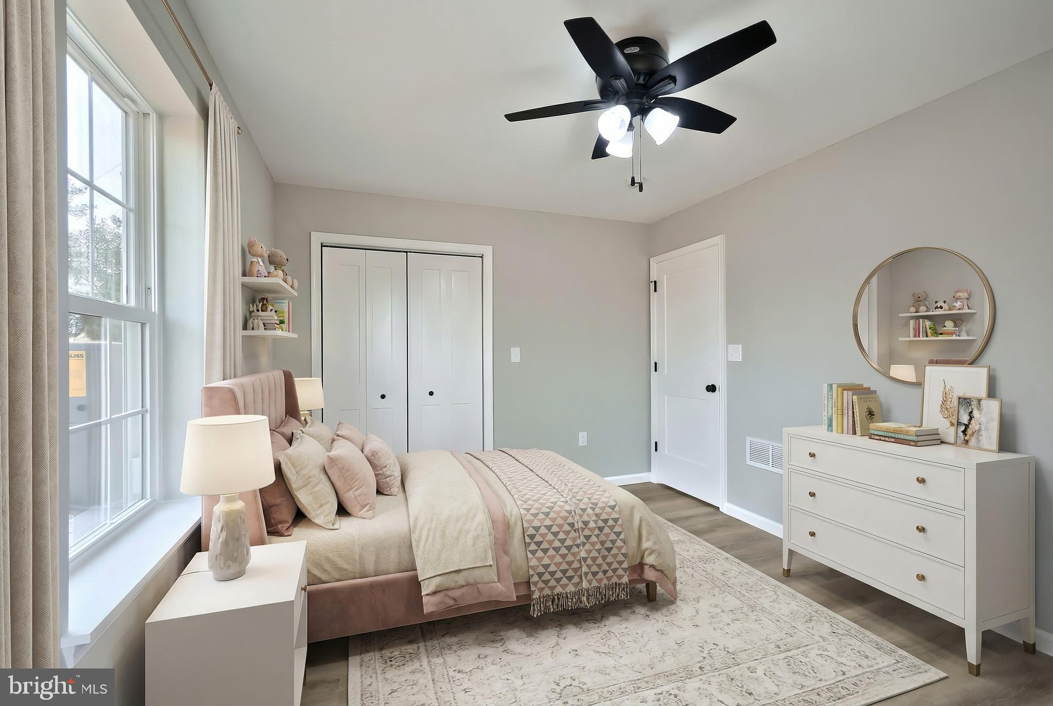 10620 Enfield Road Felton, PA 17322 - Photo 38 of 62 a bed room with a bed and a chandelier