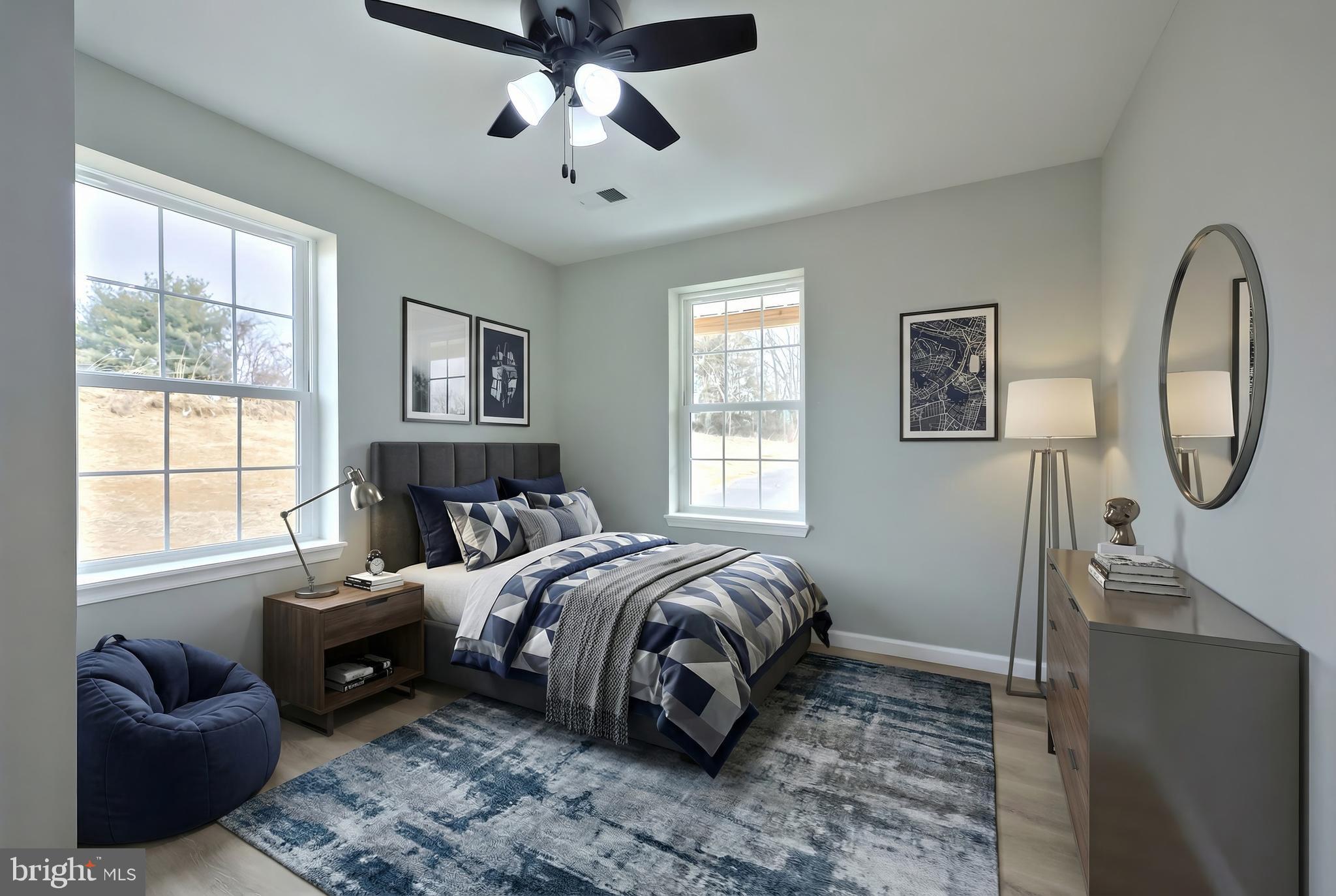 10620 Enfield Road Felton, PA 17322 - Photo 43 of 62 a bedroom with a bed window and couch