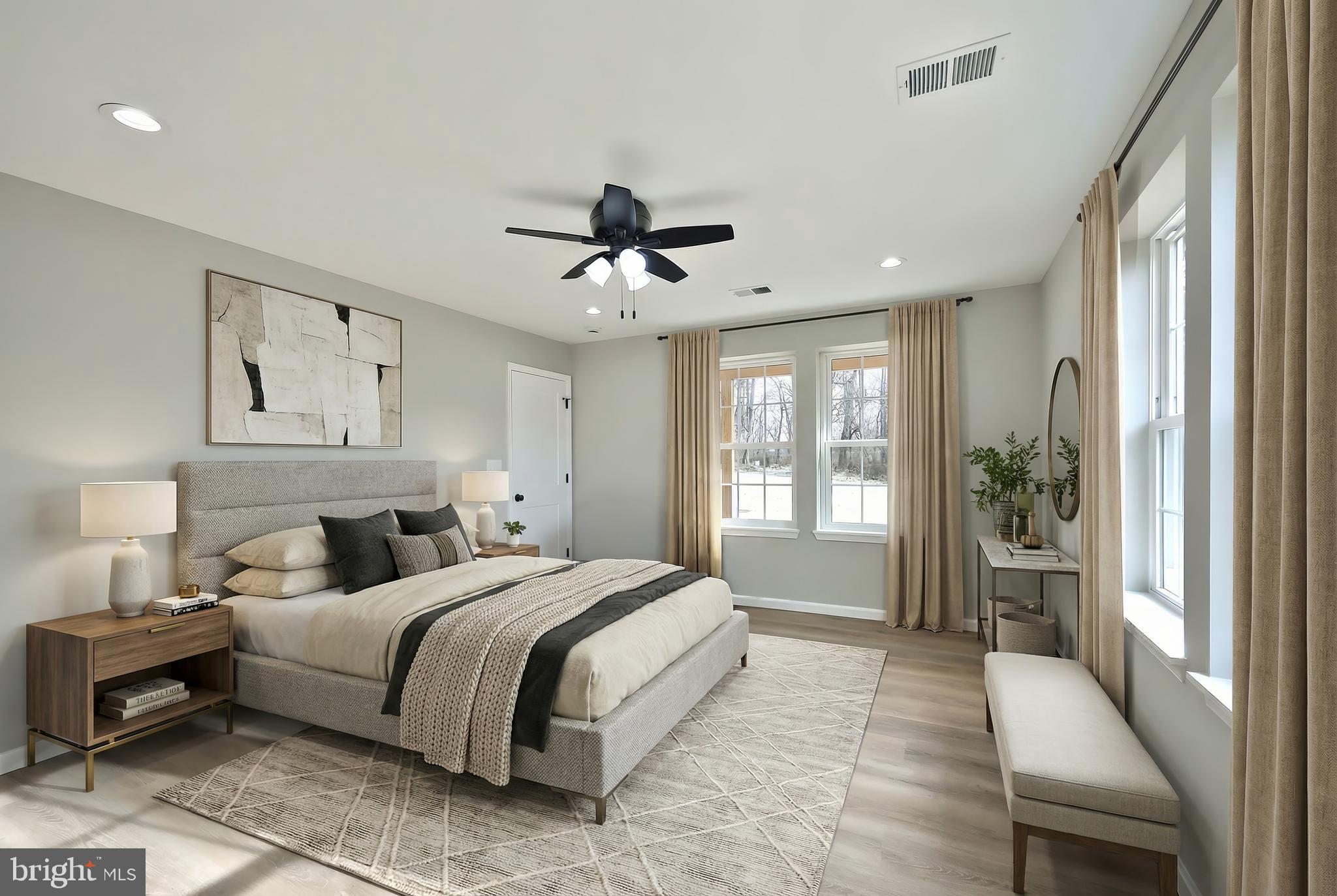 10620 Enfield Road Felton, PA 17322 - Photo 47 of 62 a spacious bedroom with a large bed and a chandelier