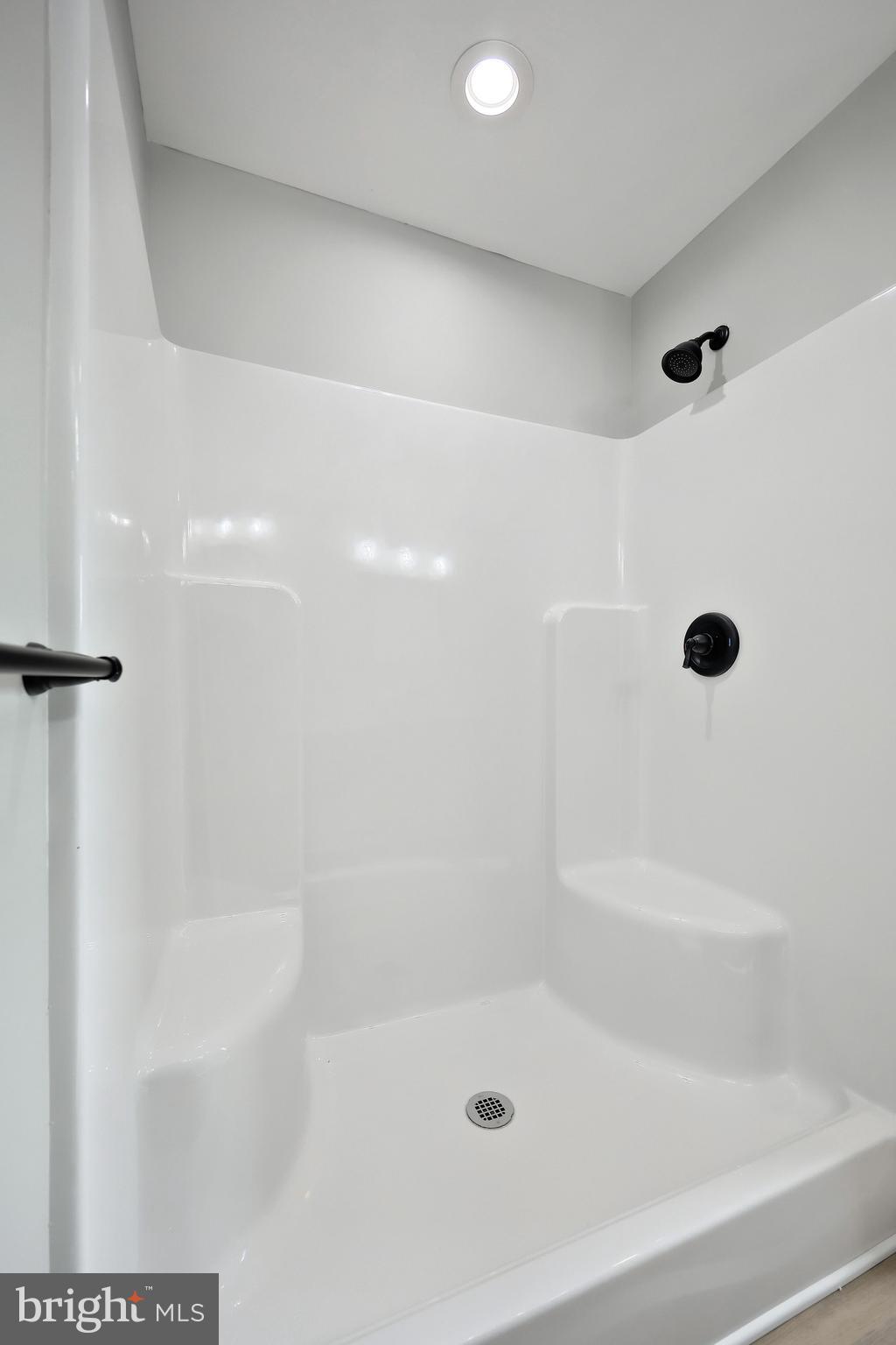 10620 Enfield Road Felton, PA 17322 - Photo 50 of 62 a close up of a bathtub in a bathroom