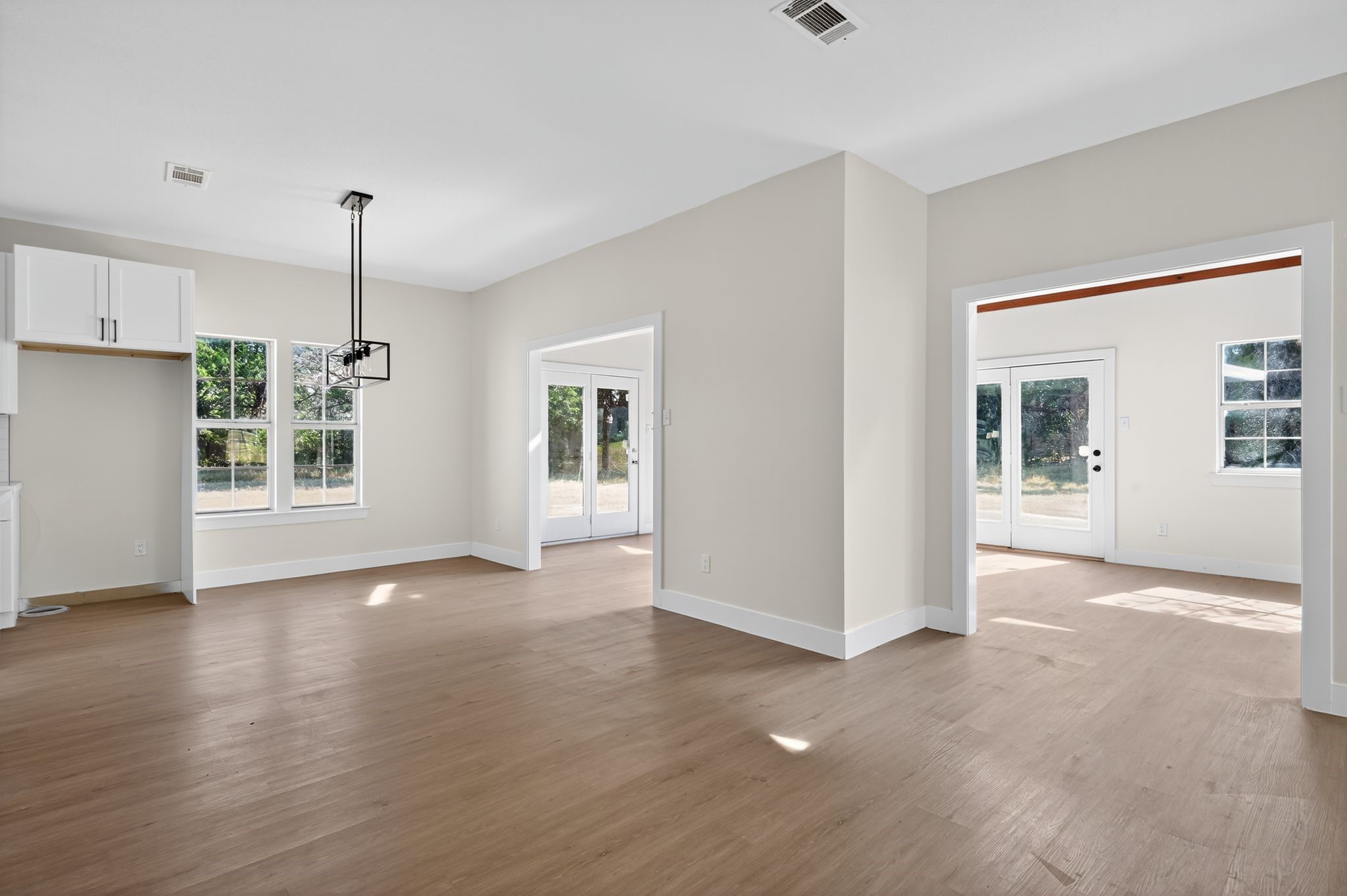300 Fawn Lane Georgetown, TX 78628 - Photo 16 of 43 a view of a kitchen with wooden floor and a window