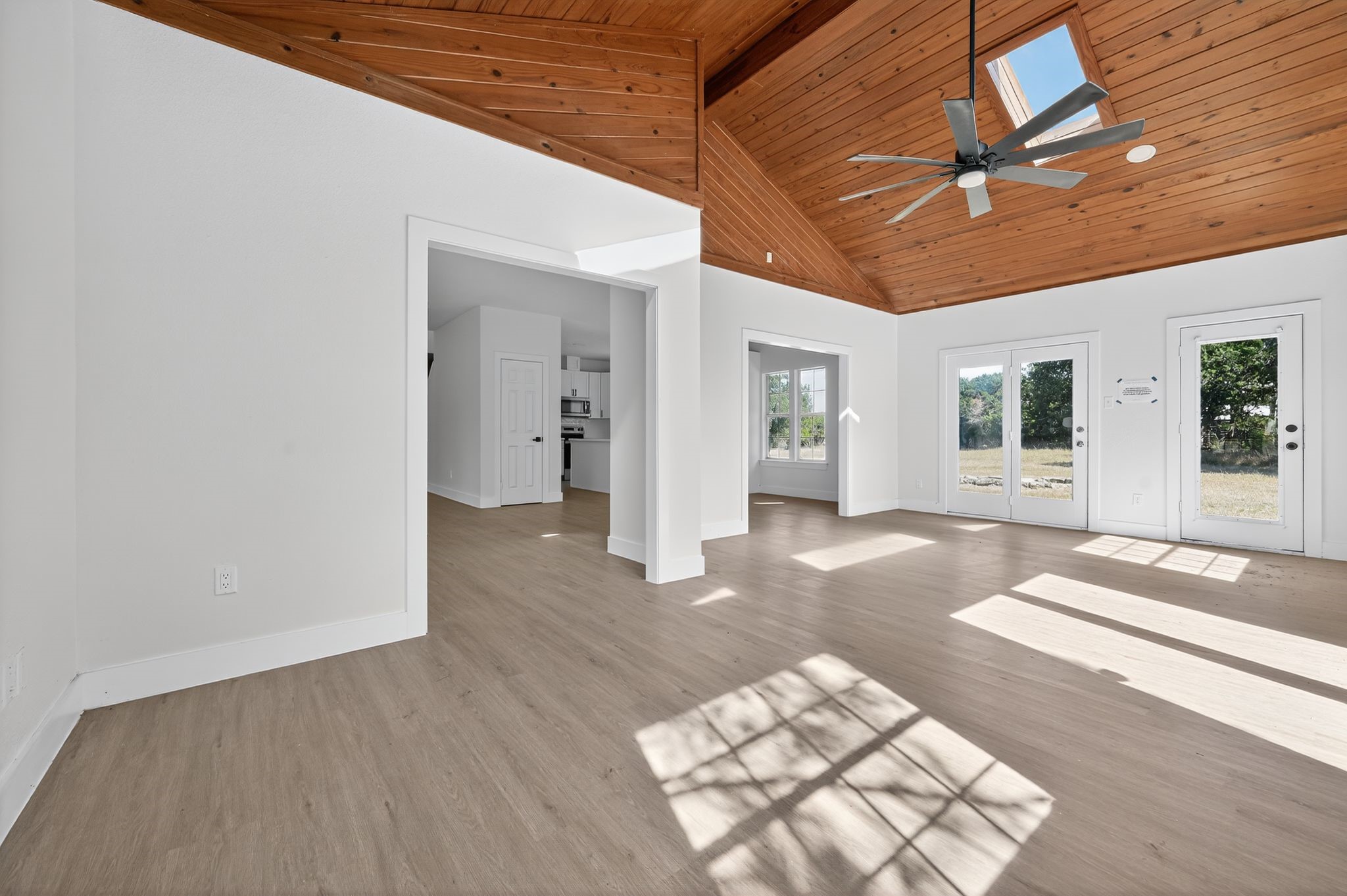 300 Fawn Lane Georgetown, TX 78628 - Photo 19 of 43 a view of a hall with wooden floor and a rug