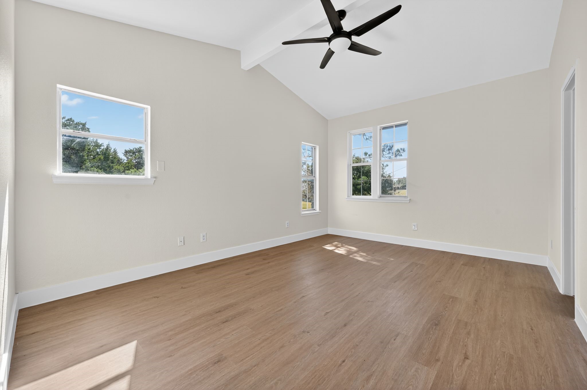 300 Fawn Lane Georgetown, TX 78628 - Photo 22 of 43 a view of empty room with wooden floor and ceiling fan