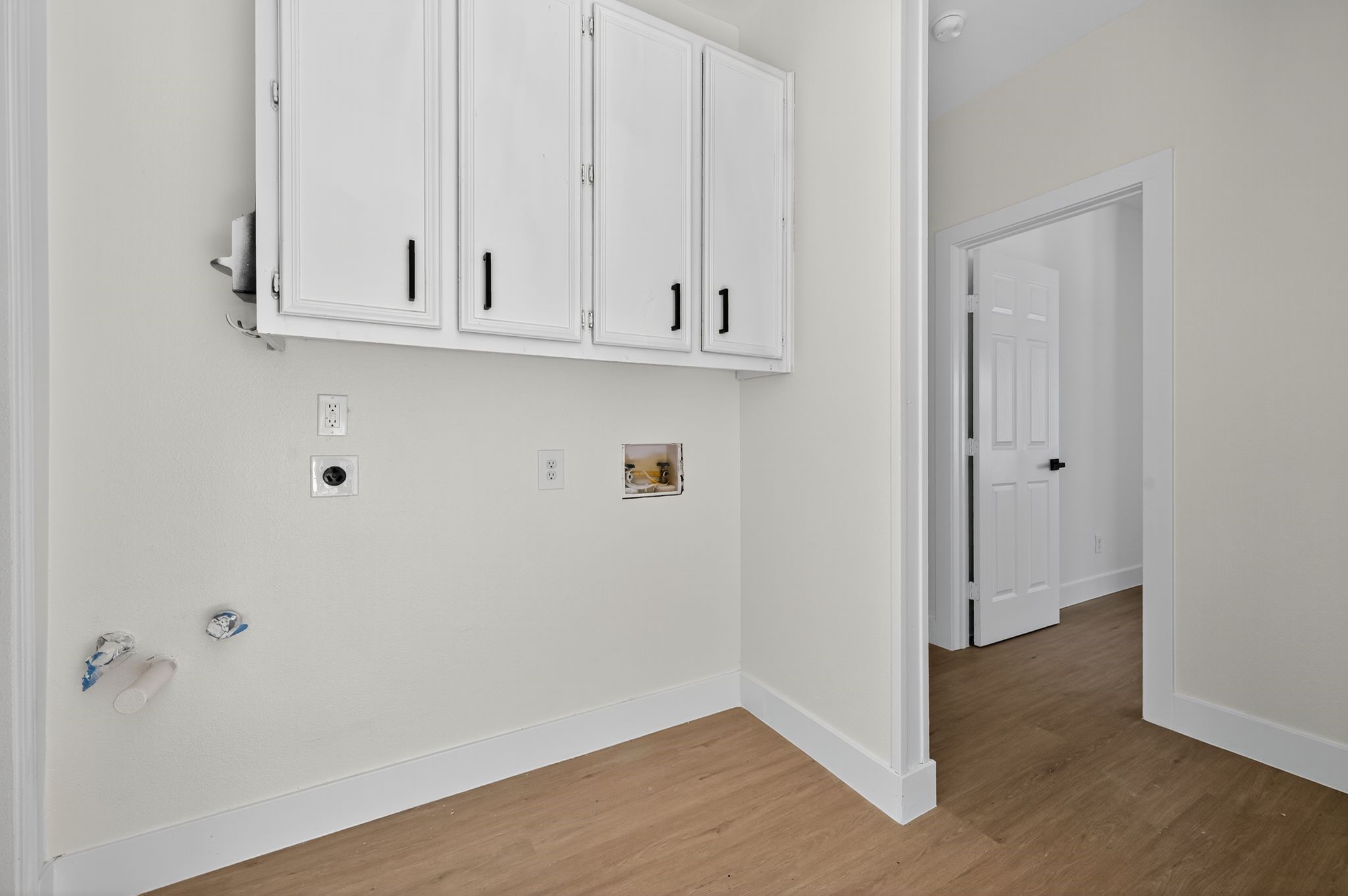 300 Fawn Lane Georgetown, TX 78628 - Photo 27 of 43 a view of cabinets and wooden floor