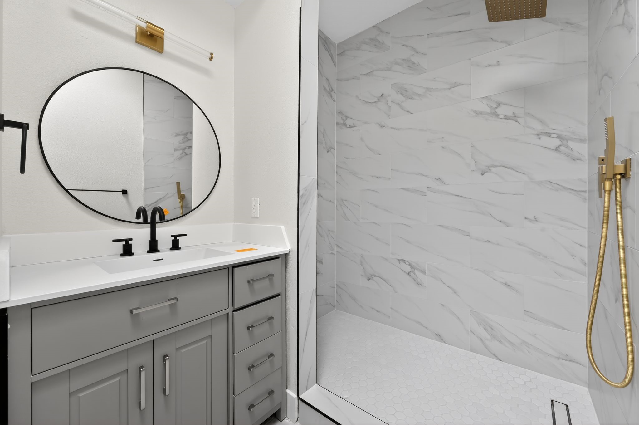 300 Fawn Lane Georgetown, TX 78628 - Photo 29 of 43 a bathroom with a sink and a mirror