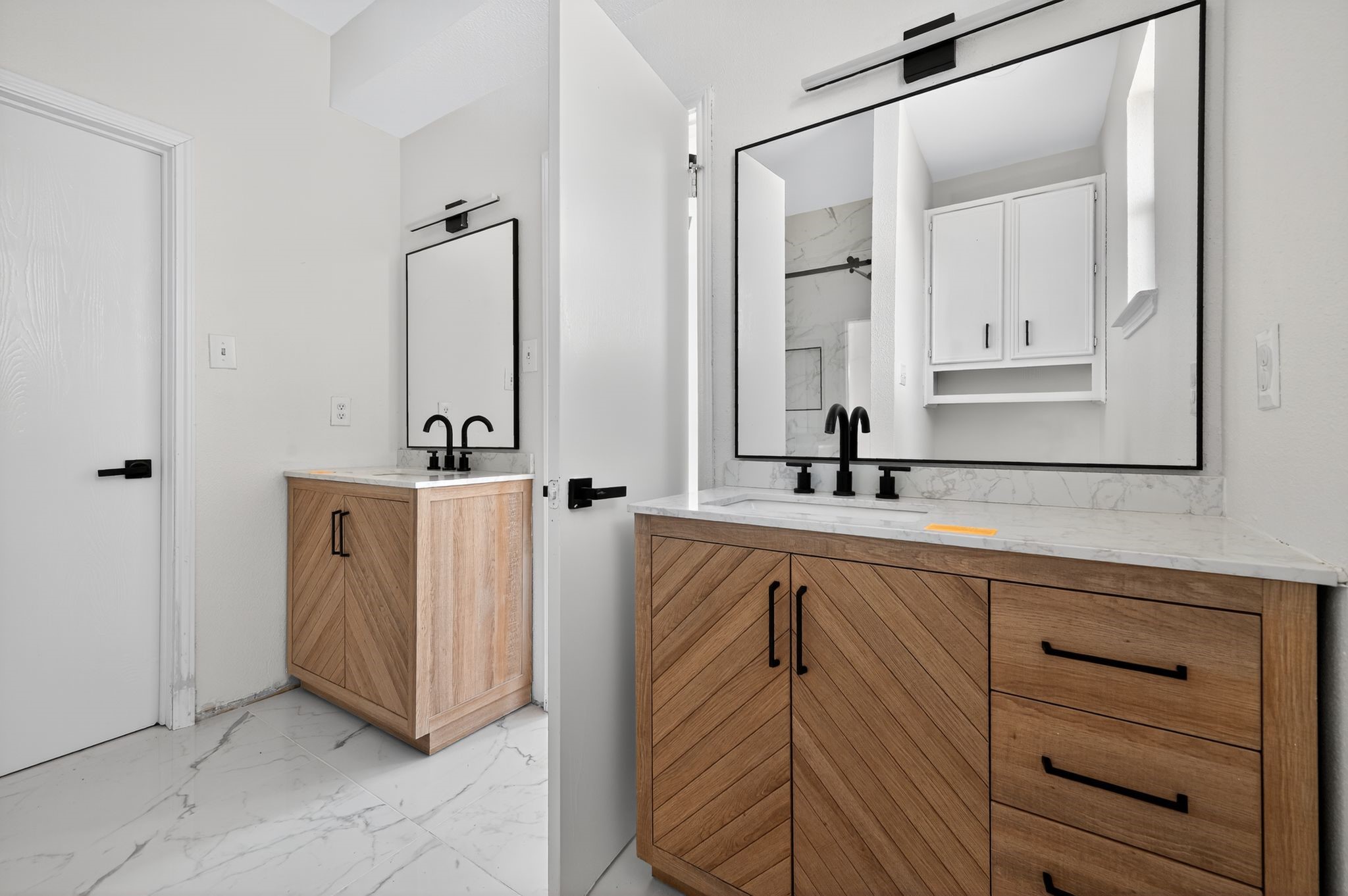 300 Fawn Lane Georgetown, TX 78628 - Photo 35 of 43 a bathroom with a double vanity sink and mirror