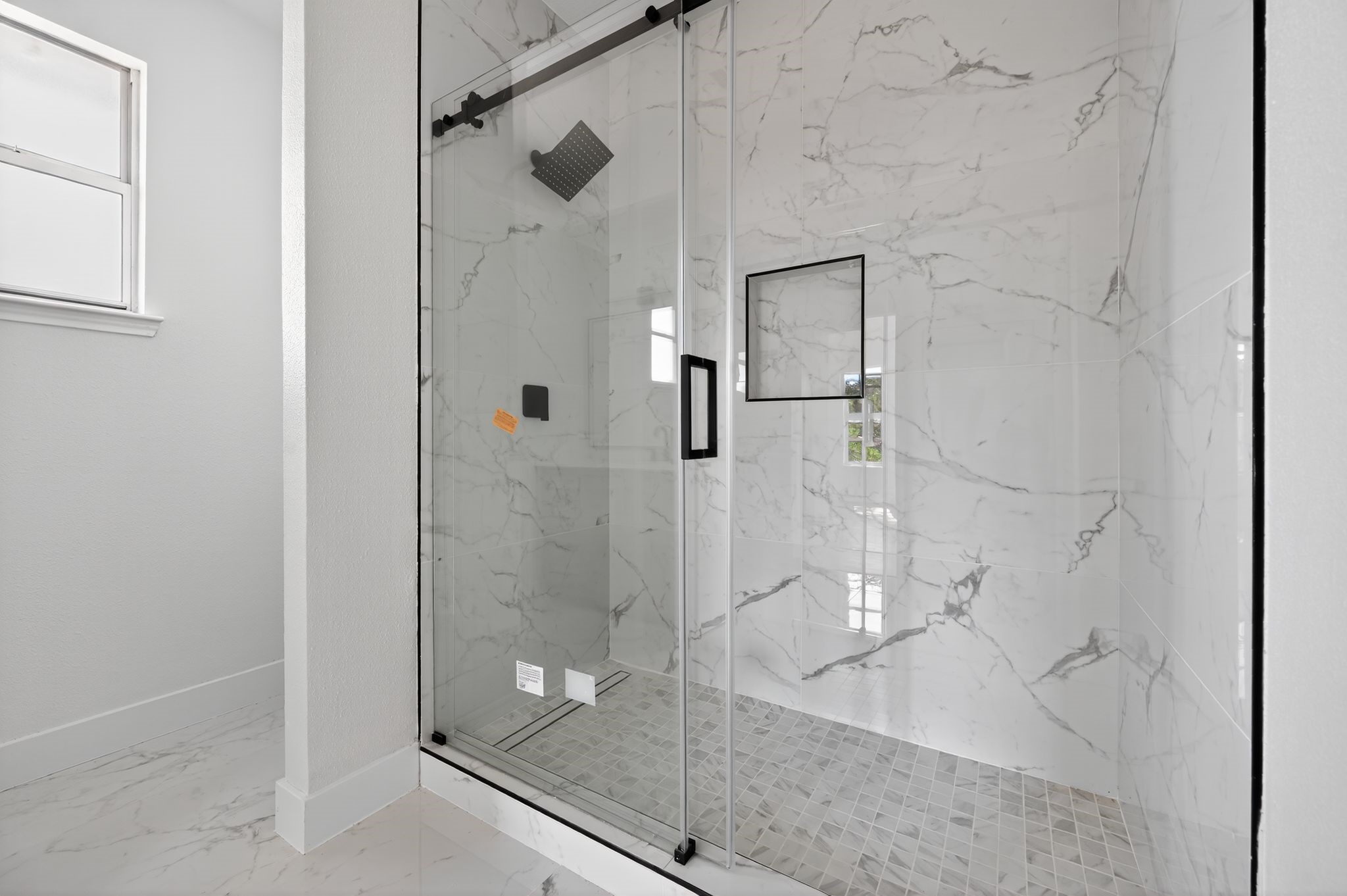 300 Fawn Lane Georgetown, TX 78628 - Photo 36 of 43 a bathroom with a glass shower door