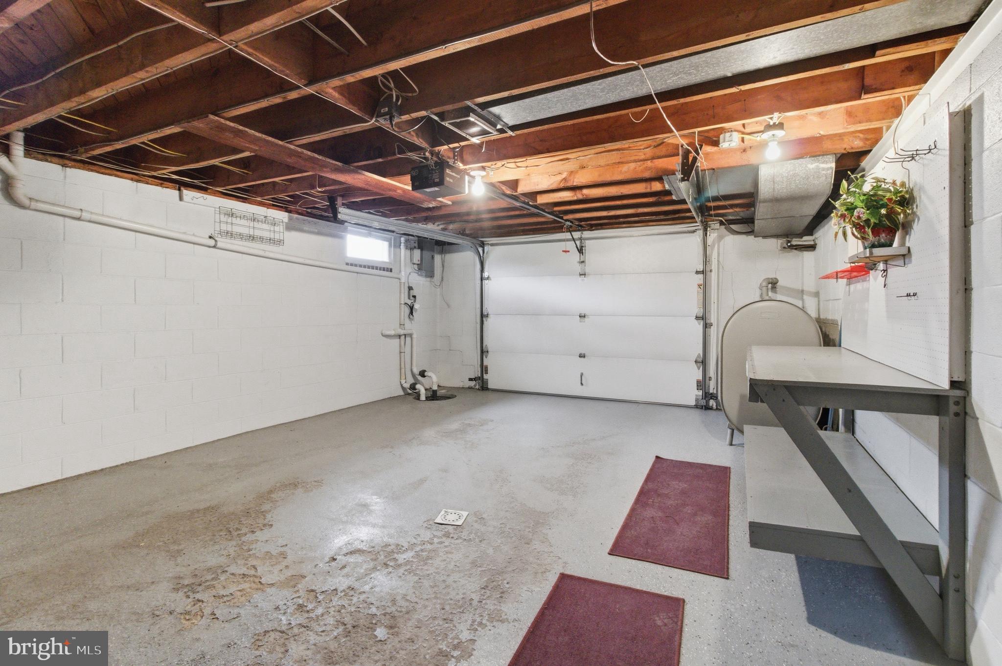684 Powell Street Hawk Run, PA 16840 - Photo 6 of 35 Interior of 1 car garage with fuel tank storage.