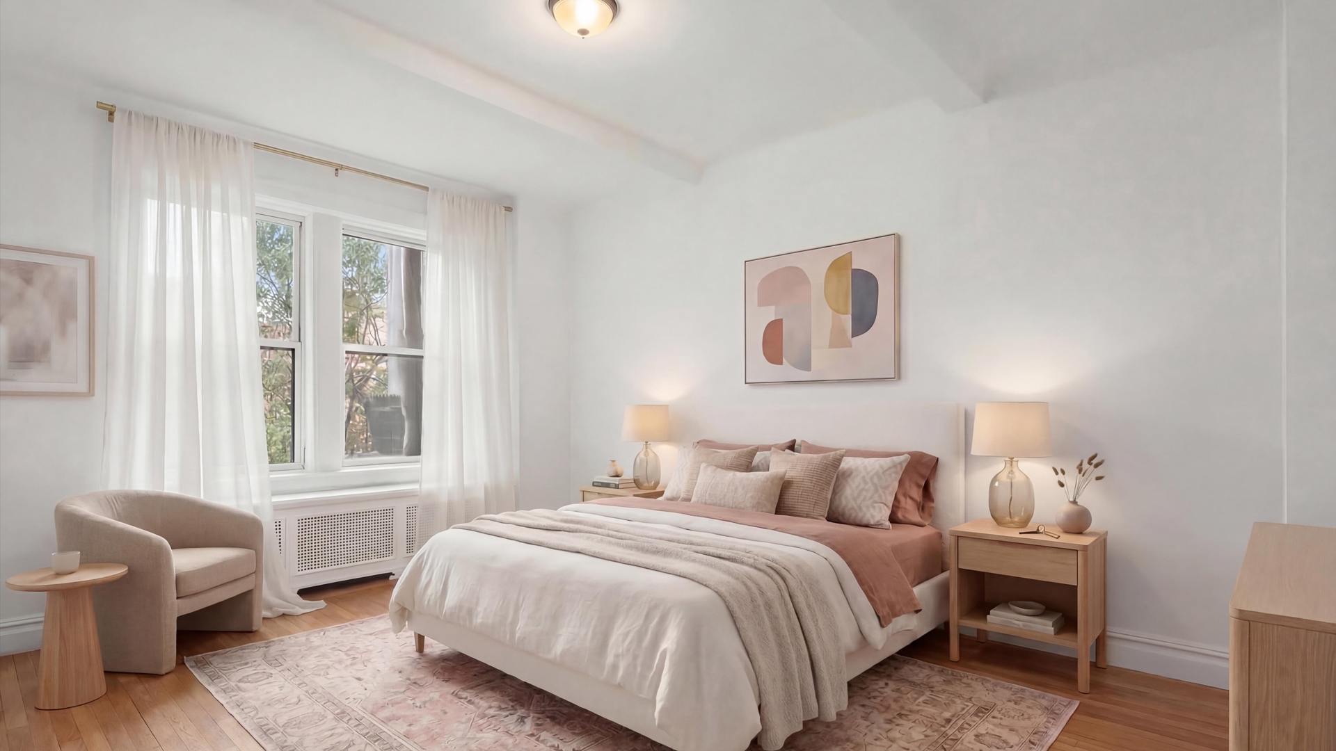 340 Riverside Drive, Unit 6D Manhattan, NY 10025 - Photo 11 of 26 a bedroom with a bed and a large window